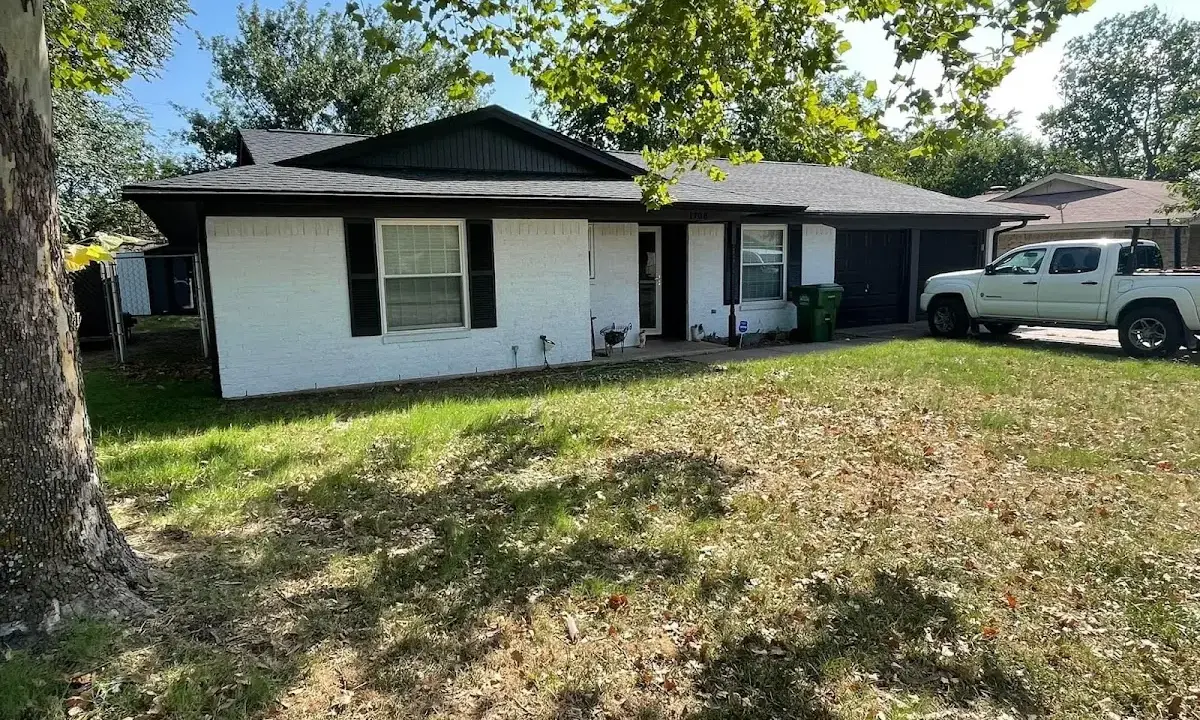 Professional roofing crew working on a residential roof in Bonner Springs